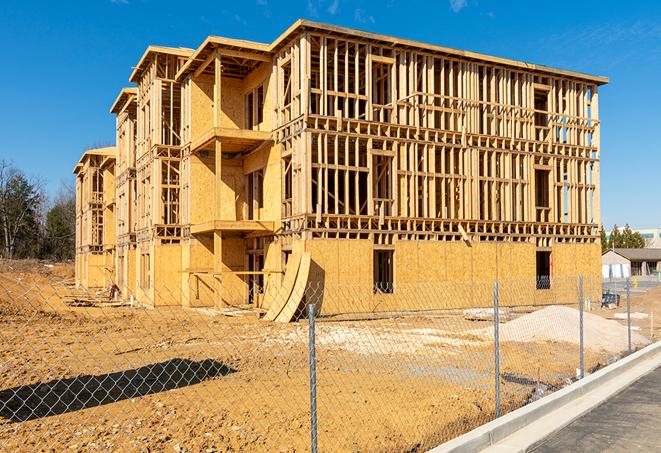 a snapshot of temporary chain link fences protecting a large construction project from unauthorized access in Newark CA